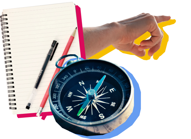 Notepad with hand pointing and compass